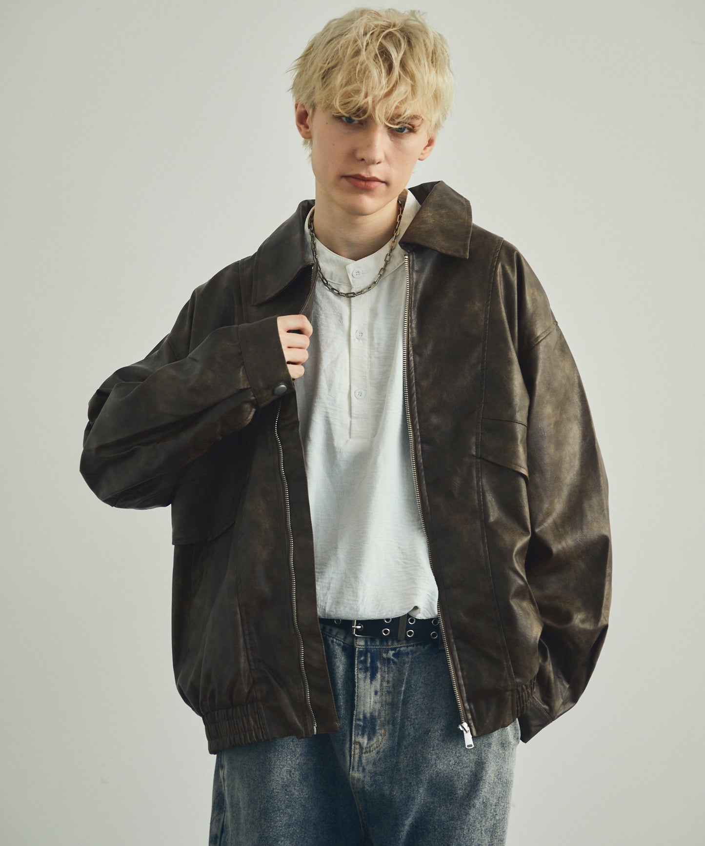 Vintage-like fake leather oversized zip-up blouson